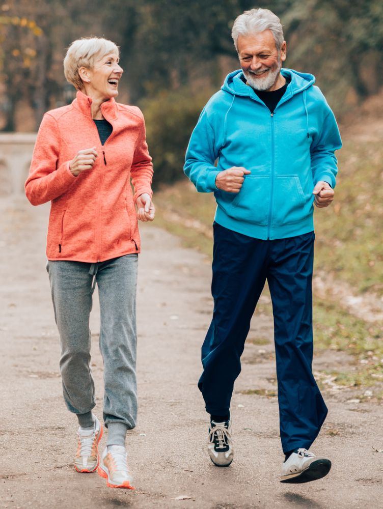 joyful old couple jogging Our Approach to Acupuncture Care for Cumming Patients